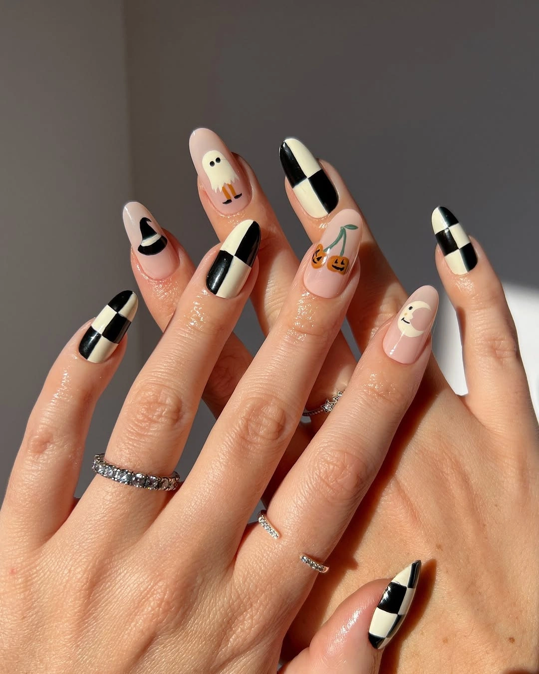 trendy fall almond nails 2026 Playful Halloween Almond Nails In Black And Cream