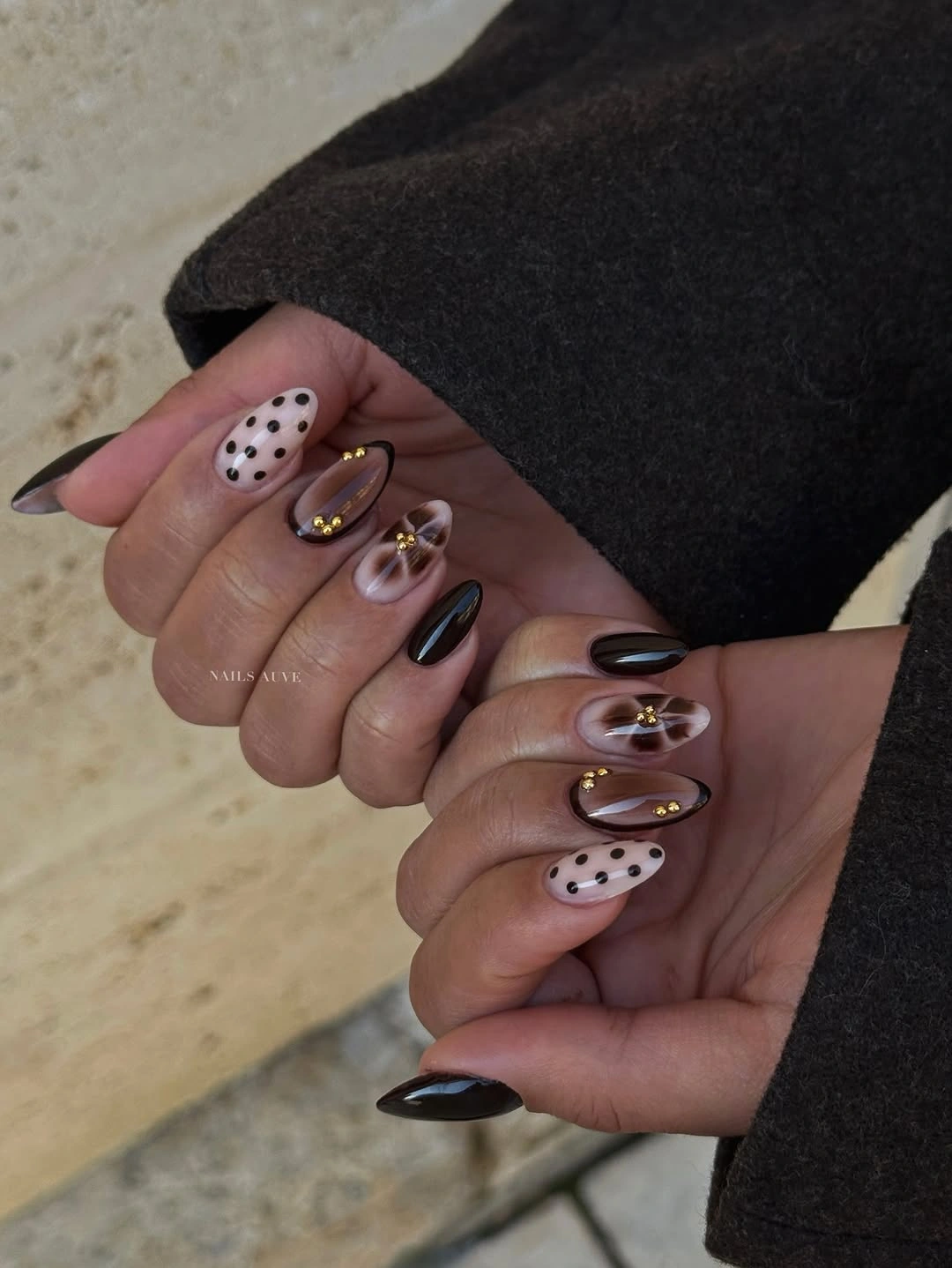 trendy fall almond nails 2026 Chocolate Floral Almond Nails With Gold Accents