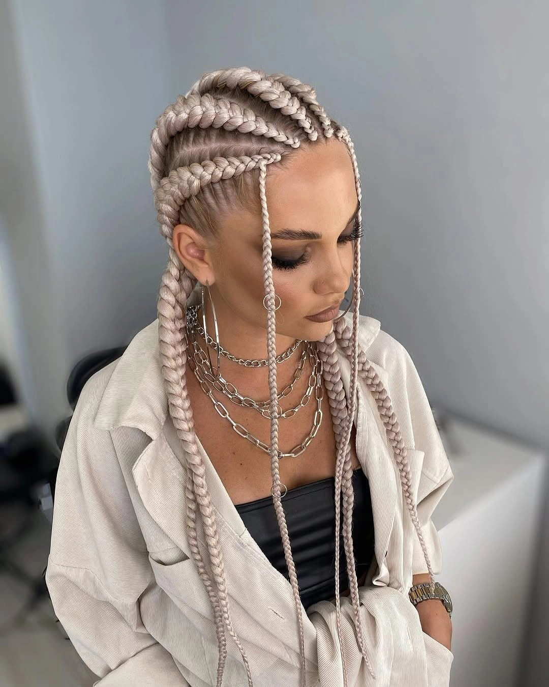 trendy feed in braid hairstyles Chunky Platinum Feed-In Braids With Modern Edge