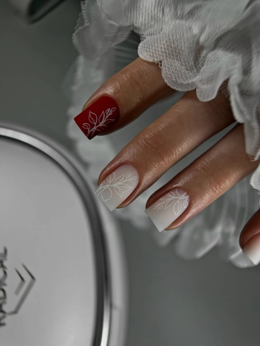 beautiful early fall nails 2026 burgundy and white botanical nails