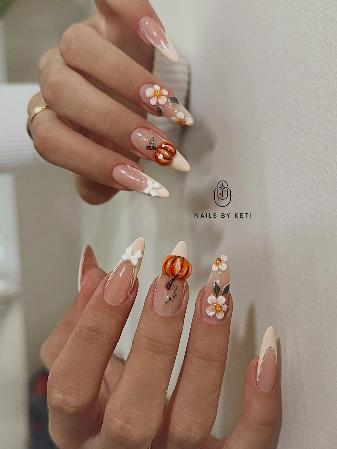 beautiful fall manicure ideas 2026 Soft Pumpkin Florals for a Cozy Early Fall Look