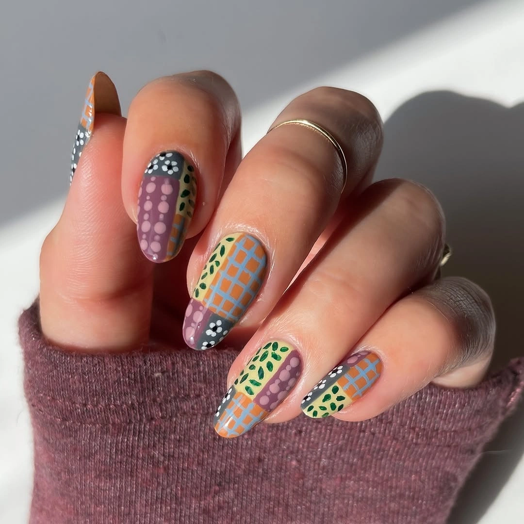 beautiful fall manicure ideas 2026 Creative Patchwork Nail Art with Modern Autumn Colors