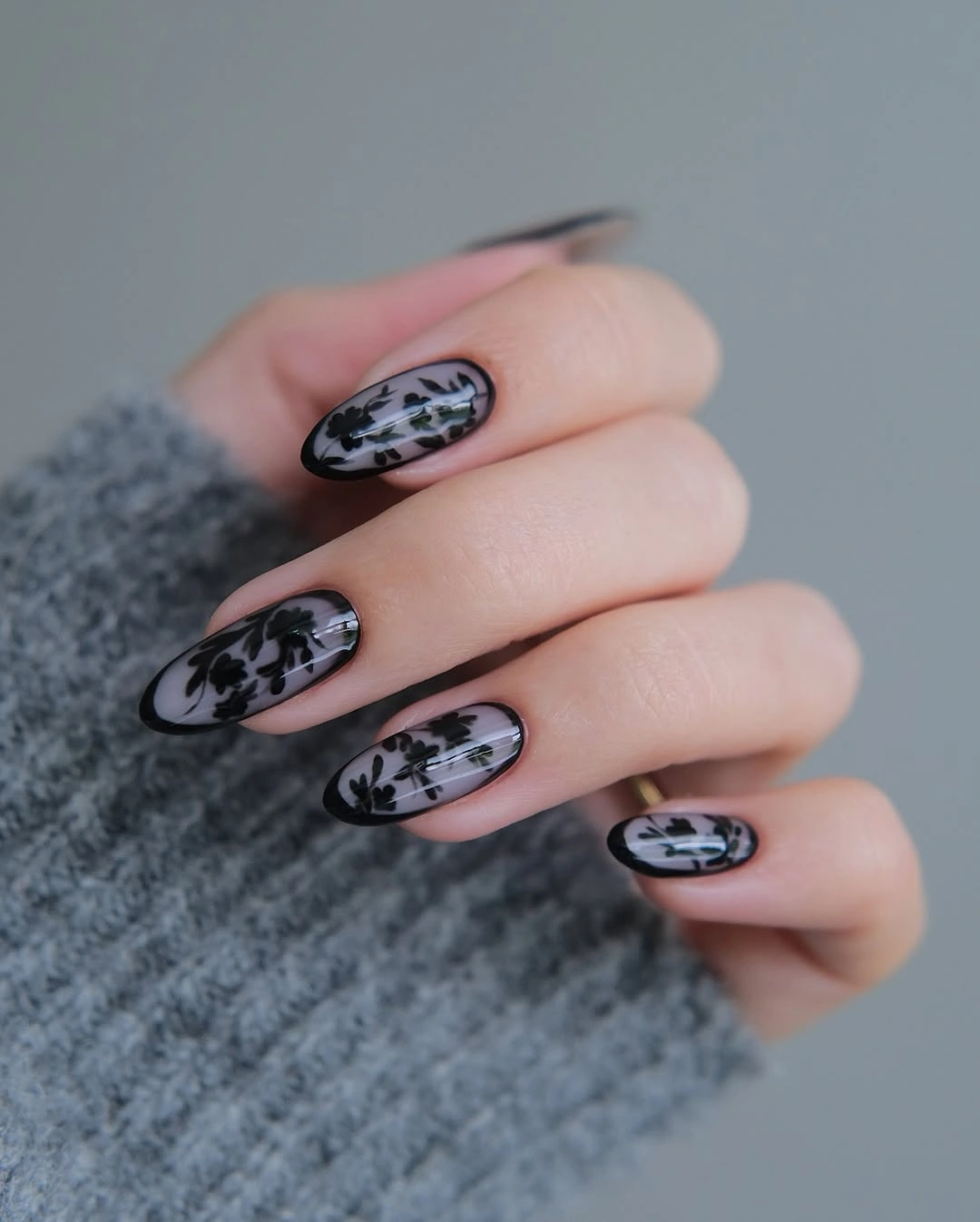 beautiful fall manicure ideas 2026 Black Floral Sheer Nails for an Elegant Autumn Mood