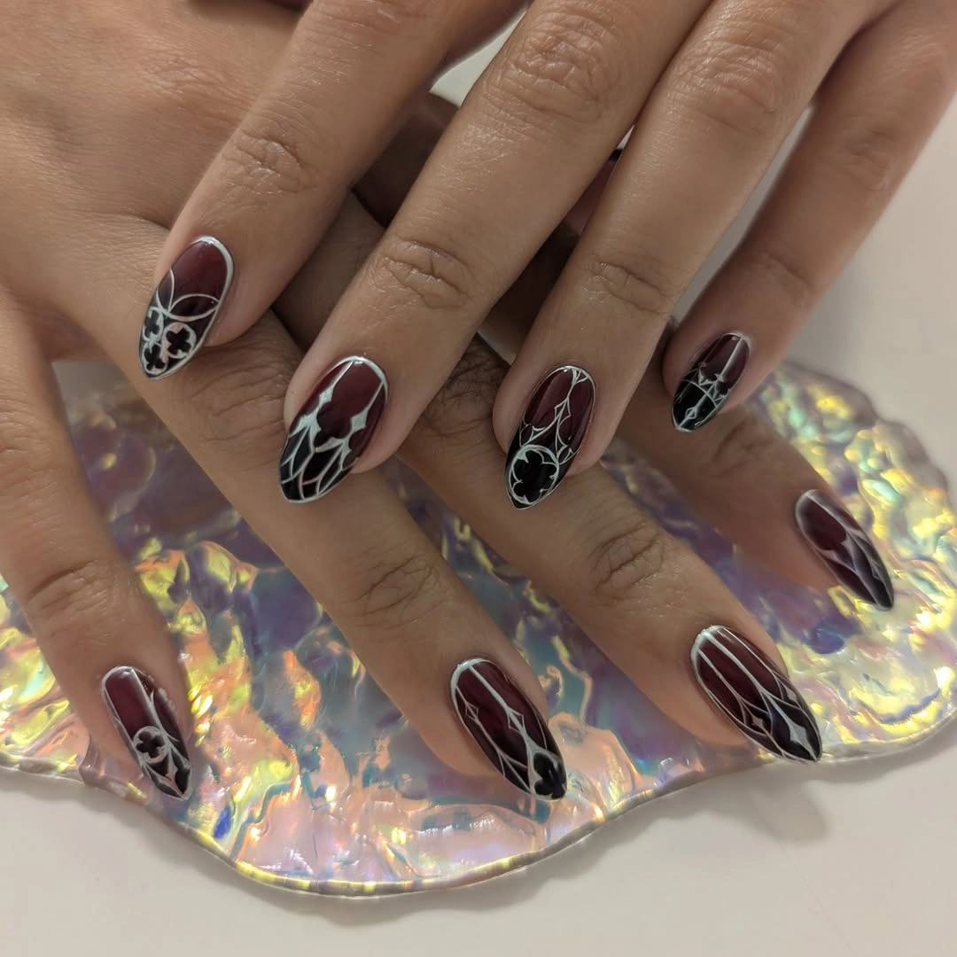 beautiful fall nail art ideas 2026 Deep Burgundy Floral Nails With a Gothic Touch