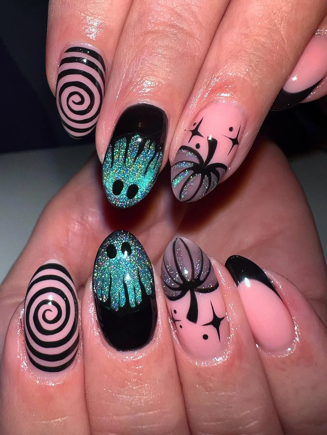 beautiful fall nail art ideas 2026 Pink and Black Spooky Swirl Nails