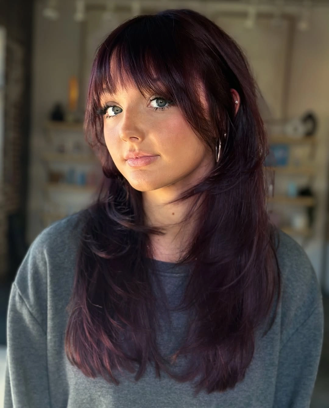 beautiful september hair colour trends 2026 Deep Plum With Soft Shag Layers