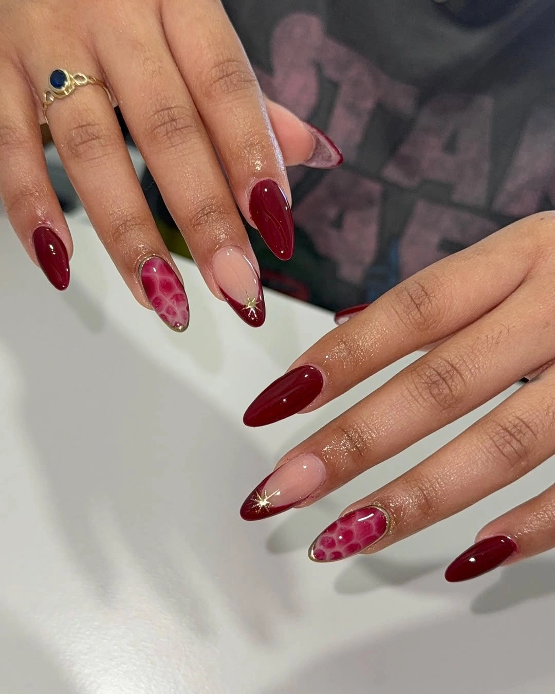 chic fall burgundy nails with design - Long Burgundy Almond Nails With Delicate Fall Details