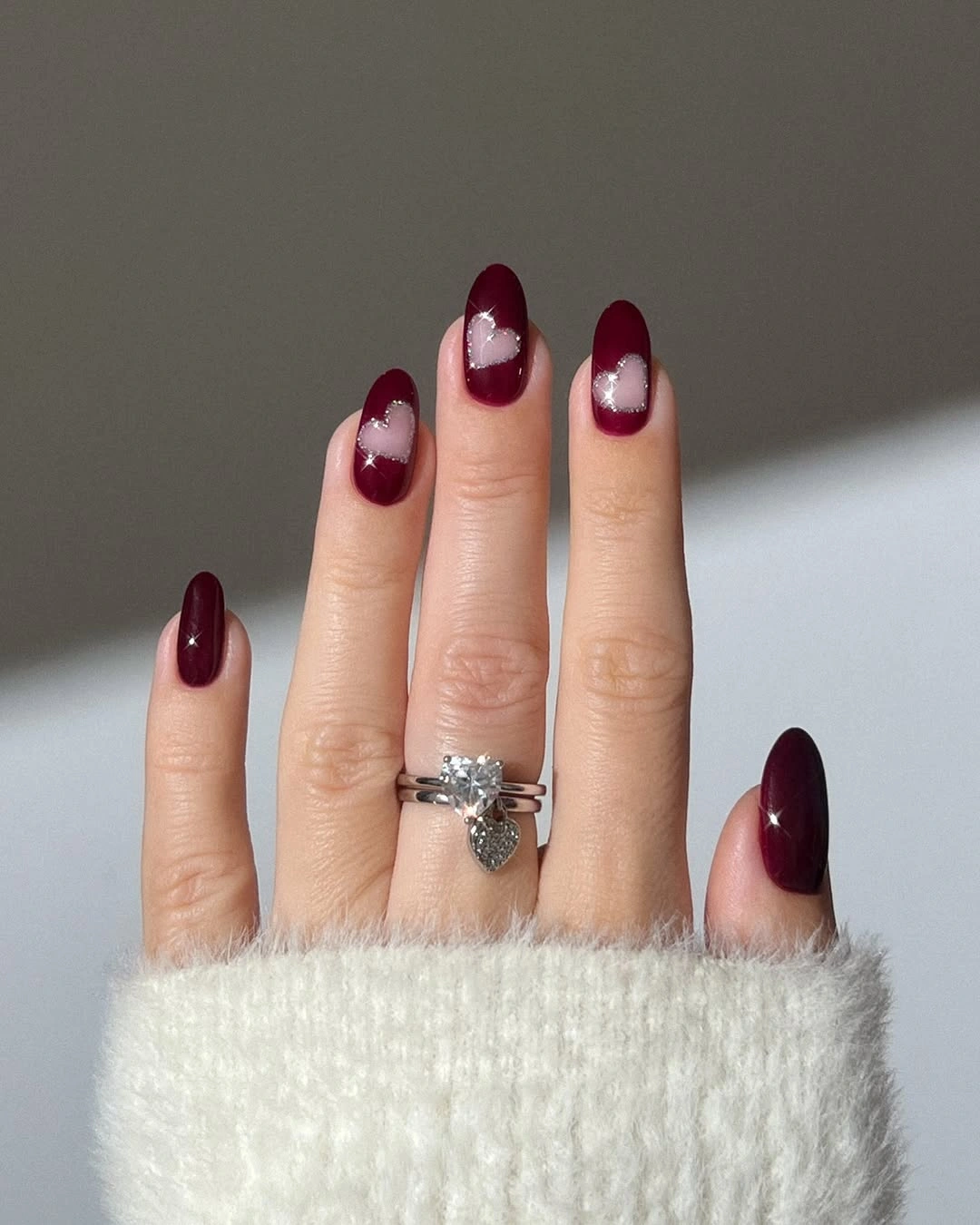 chic fall burgundy nails with design Short Burgundy Nails With Sparkling Heart Accents