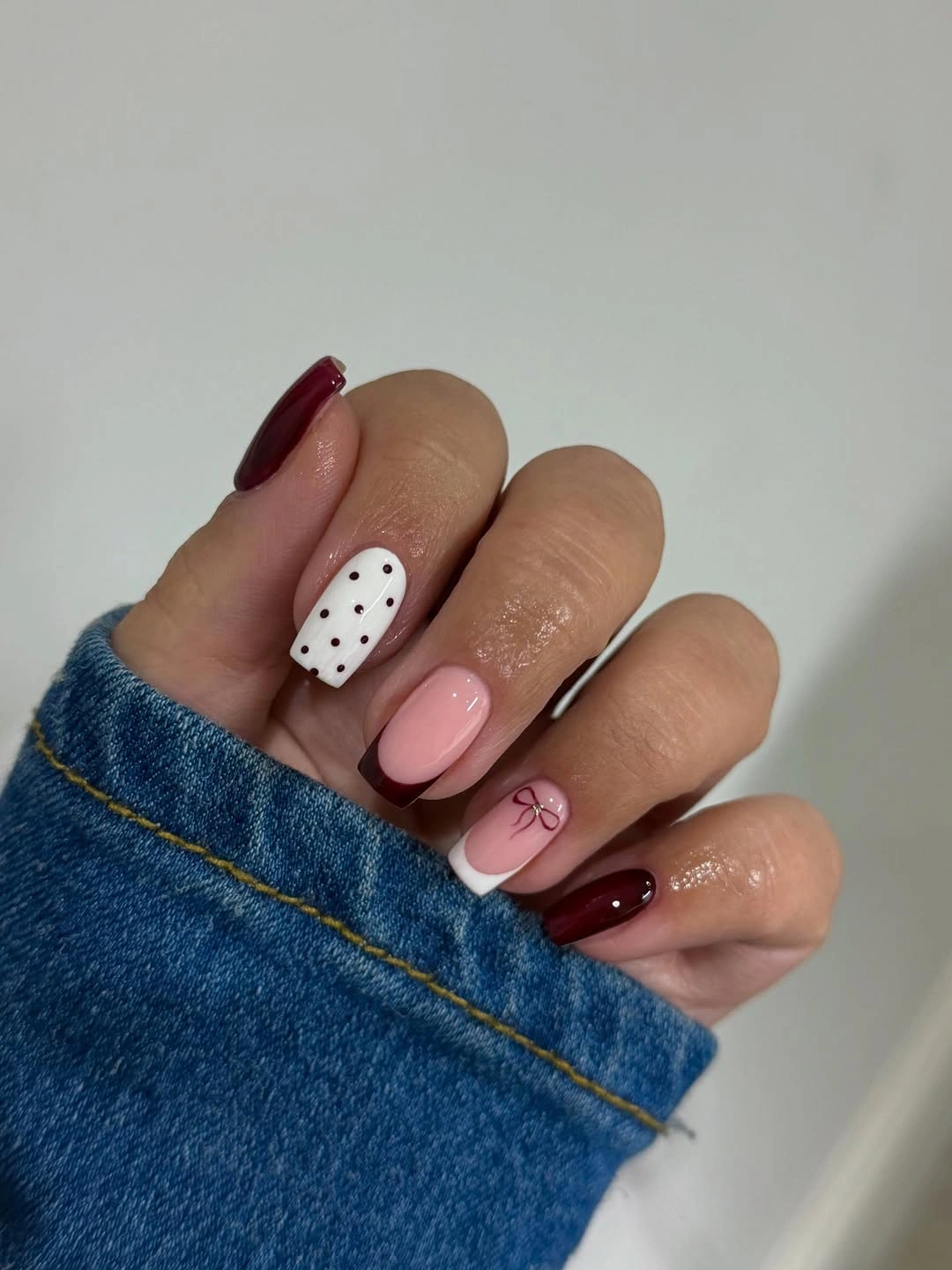 chic fall burgundy nails with design Classic Burgundy French Nails With Tiny Bow Details