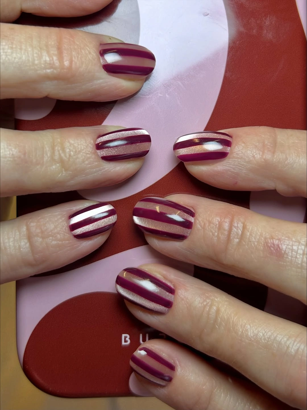 chic fall burgundy nails with design Short Burgundy Nails With Metallic Stripe Design