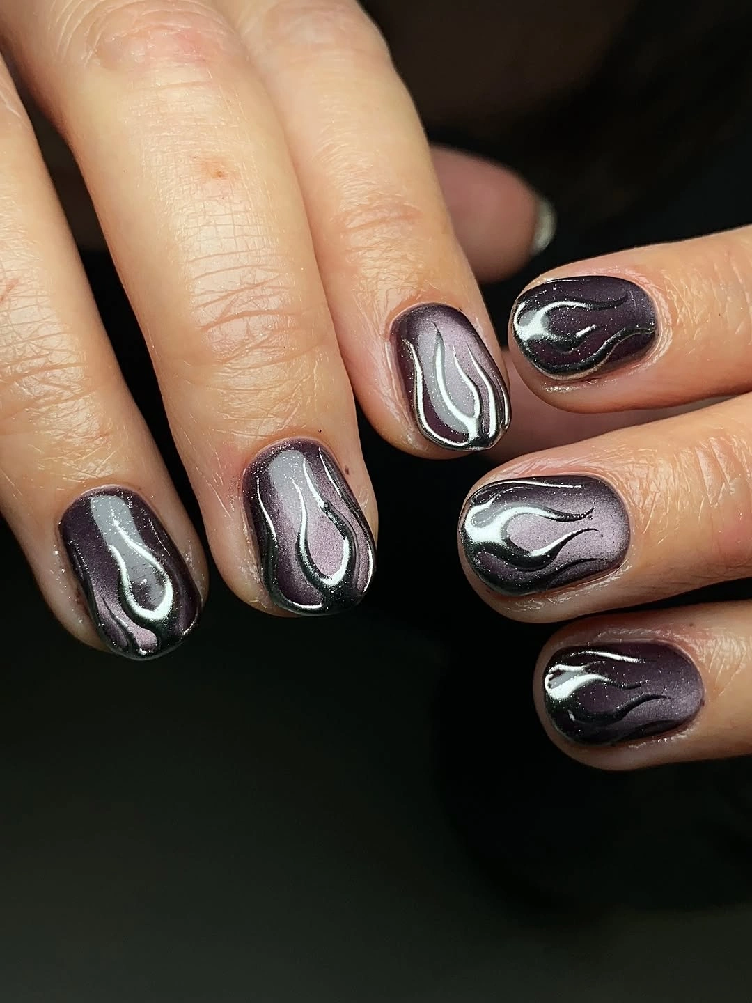 chic fall dark nail shadow ideas 2026 - Smoky Plum Chrome With Liquid Metal Details