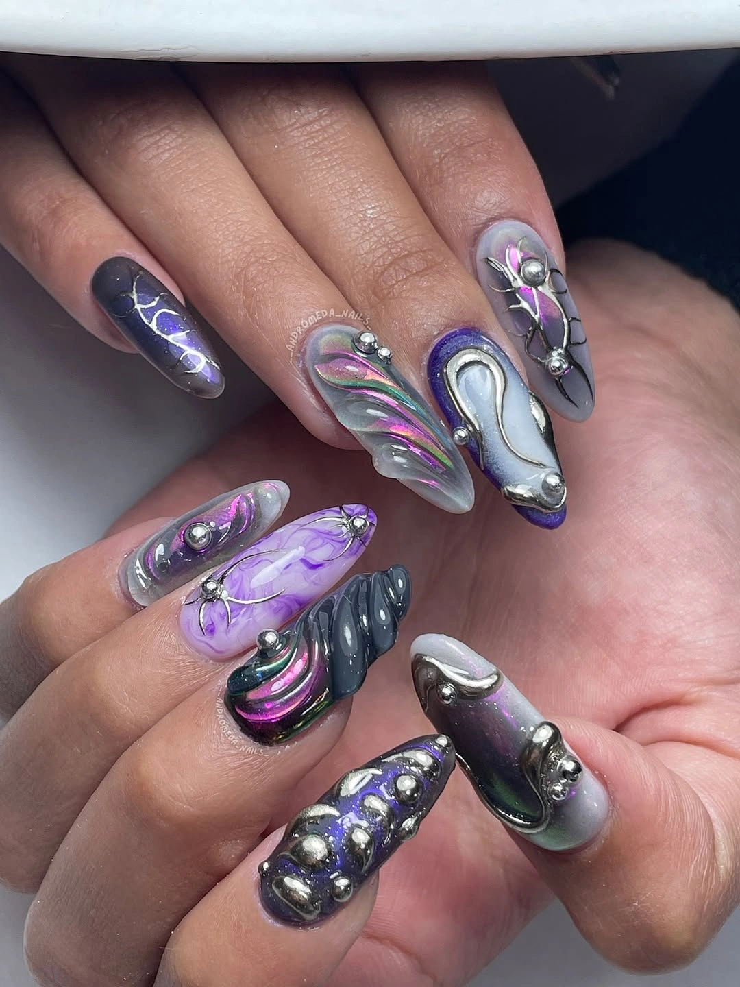 chic fall dark nail shadow ideas 2026 - Chrome Purple Gothic Sculptural Nails