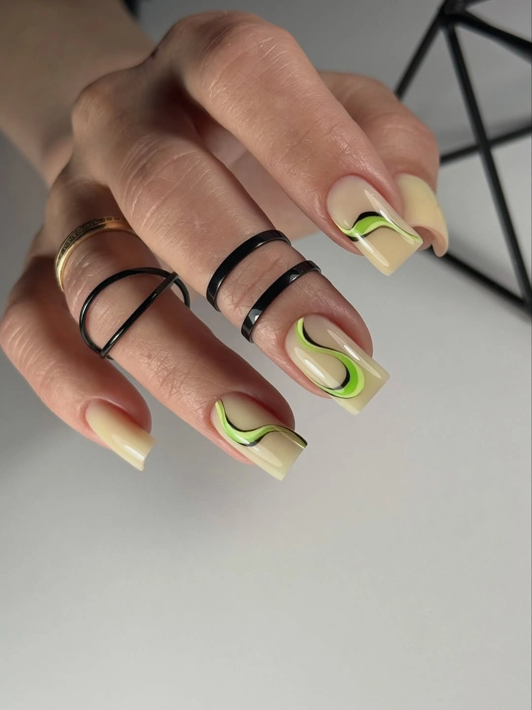 chic fall gel nails ideas 2026 - Green Swirl Gel Nails for a Playful Fall Mood