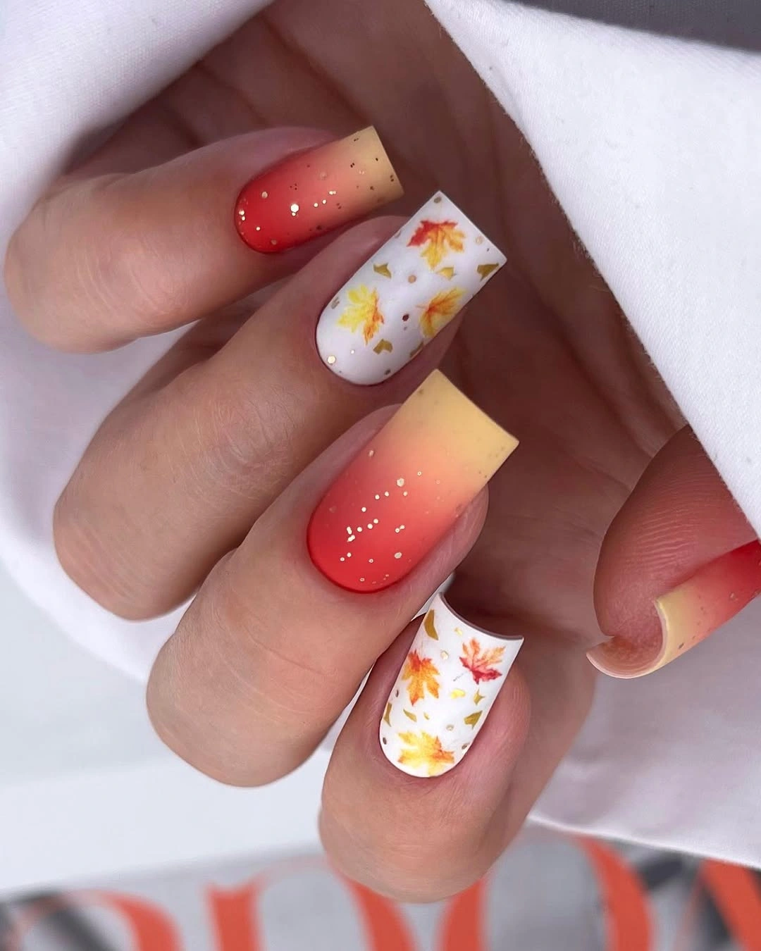 chic fall gel nails ideas 2026 short red orange autumn leaf manicure