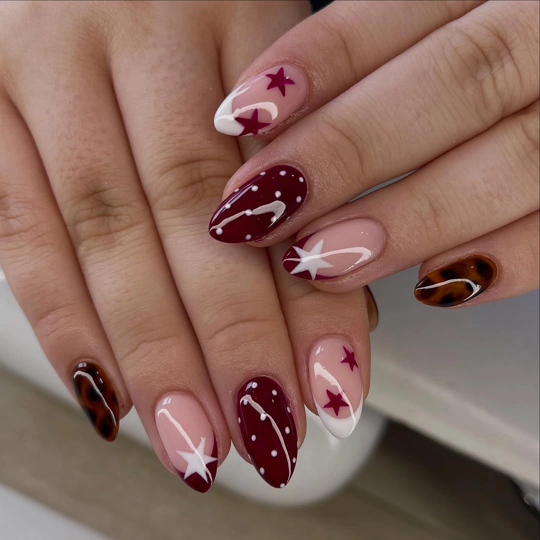chic fall nail designs for all skin tones 2026 Burgundy Stars With Tortoiseshell Accents