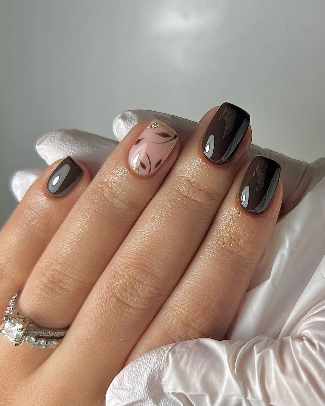 chic fall nail designs for all skin tones 2026 Deep Mocha Nails with Elegant Leaf Art