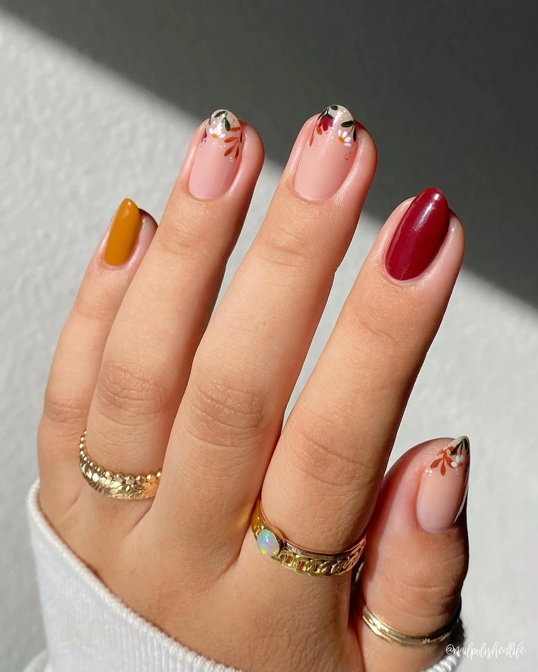 chic fall nail designs for all skin tones 2026 Delicate Floral Autumn Nails