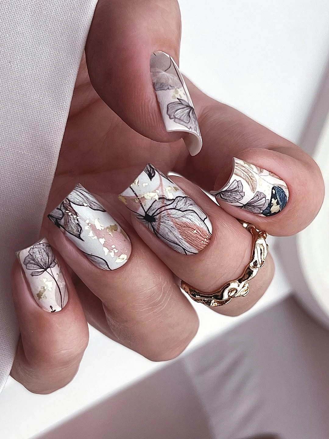 chic fall nail inspiration 2026 Soft Botanical Nails with a Modern Gallery Feel