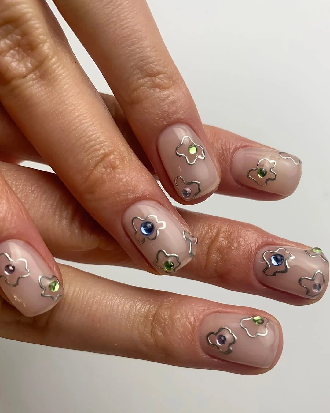 chic fall nail inspiration 2026 Minimalist Chrome Flower Nails
