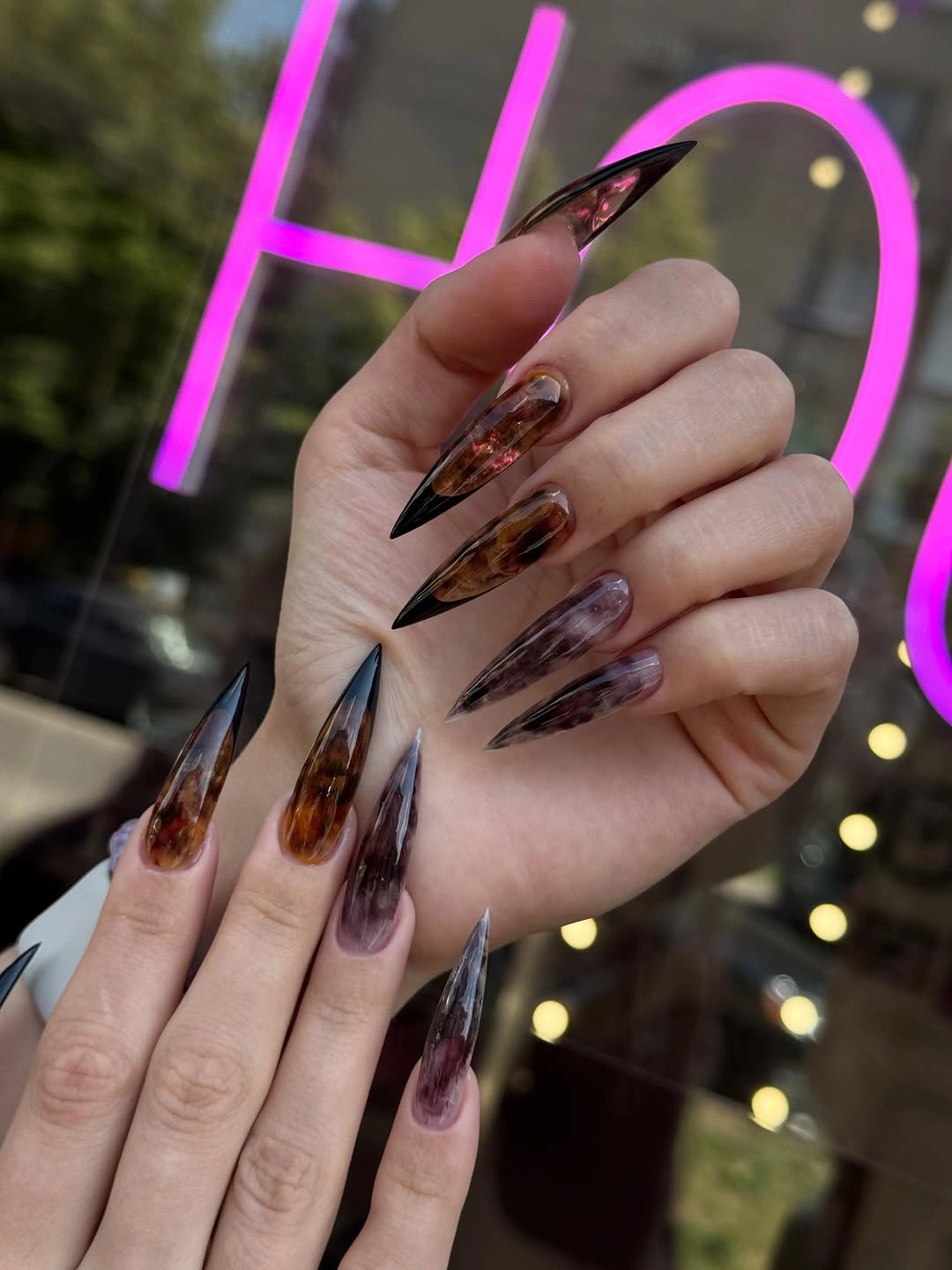 chic fall nail inspiration 2026 Smoky Tortoiseshell Stiletto Nails