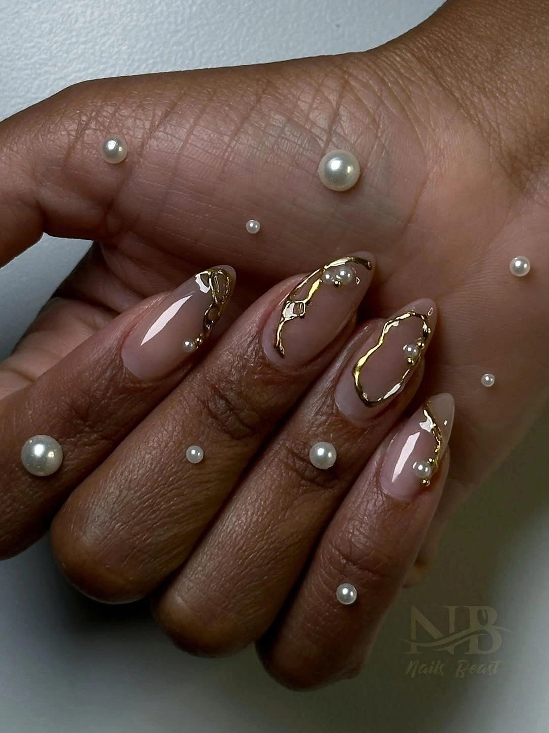 chic fall nails for brown skin tone Soft Nude Nails With Gold Pearl Framing