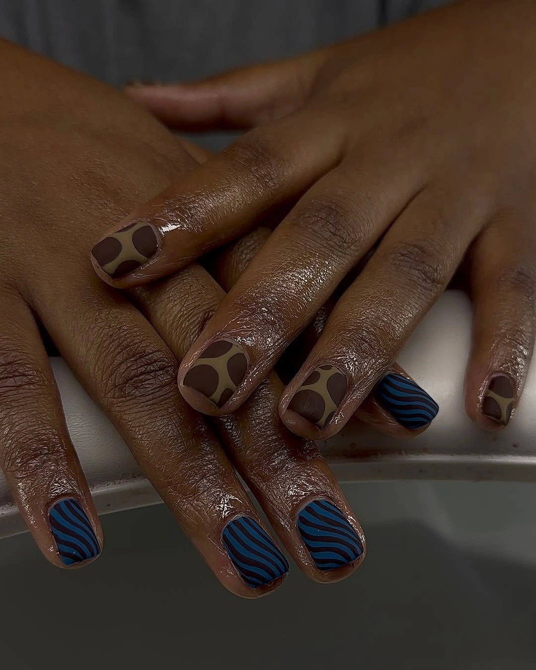 chic fall nails for brown skin tone Chocolate Waves With Midnight Blue Accents