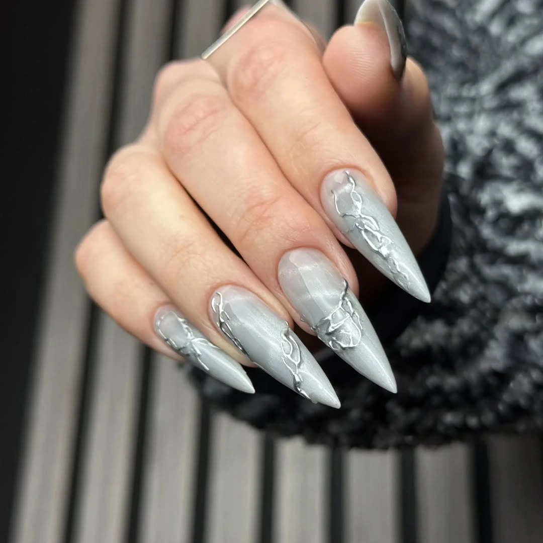 chic fall nails for pale skin 2026 Icy Silver Chrome with Sculptural Details