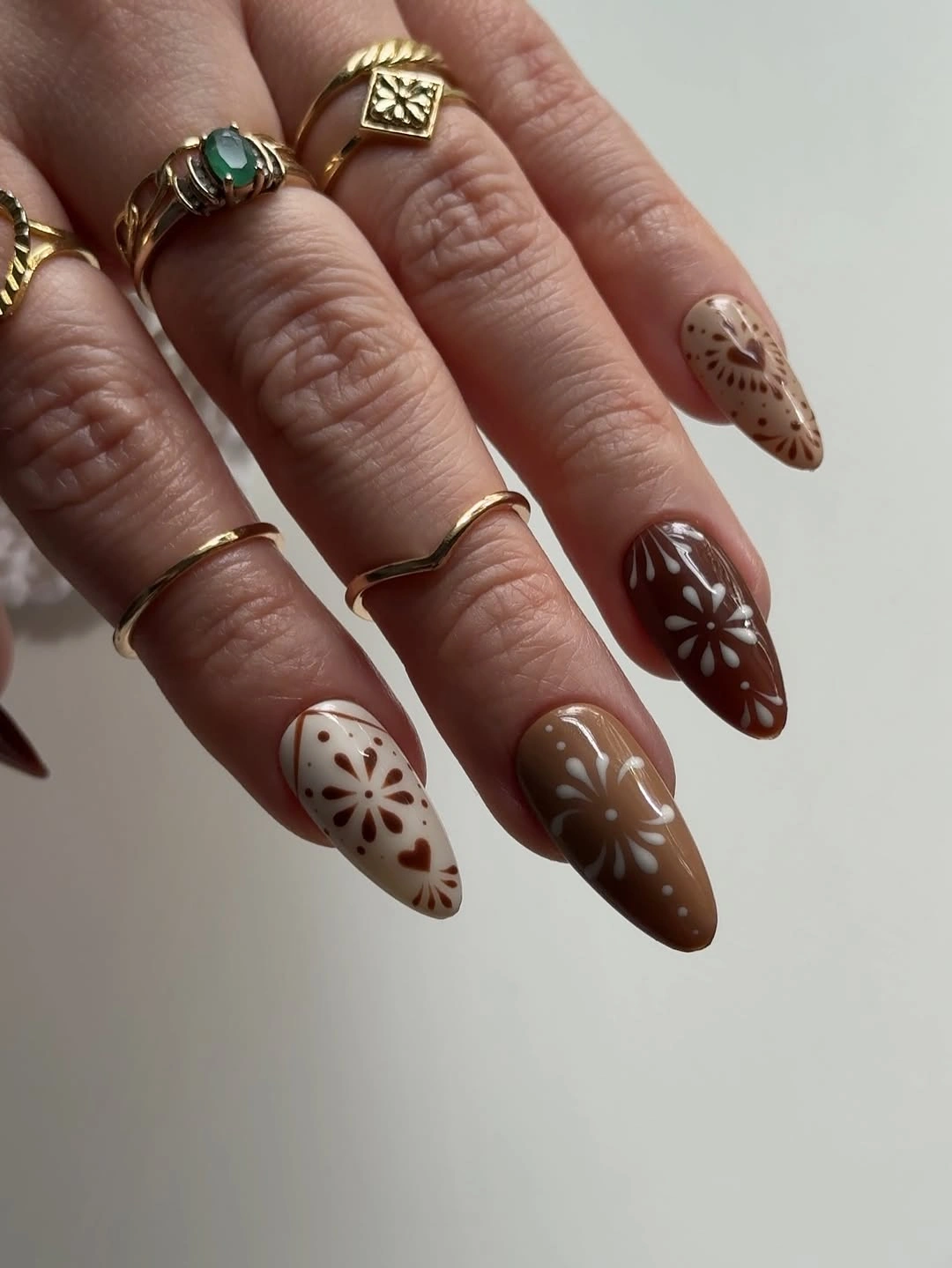 chic fall nails with autumn designs - Classy Brown Floral Nails With a Vintage Feel