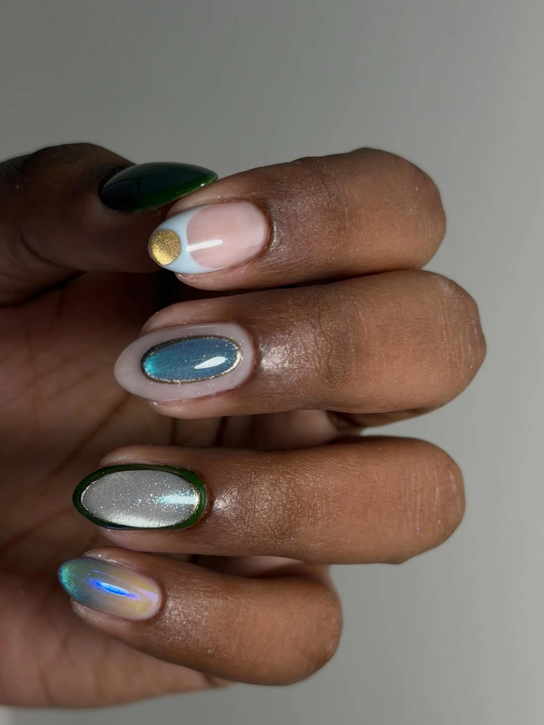 chic fall nails with autumn designs - Chrome Green and Blue Nails With a Futuristic Fall Mood