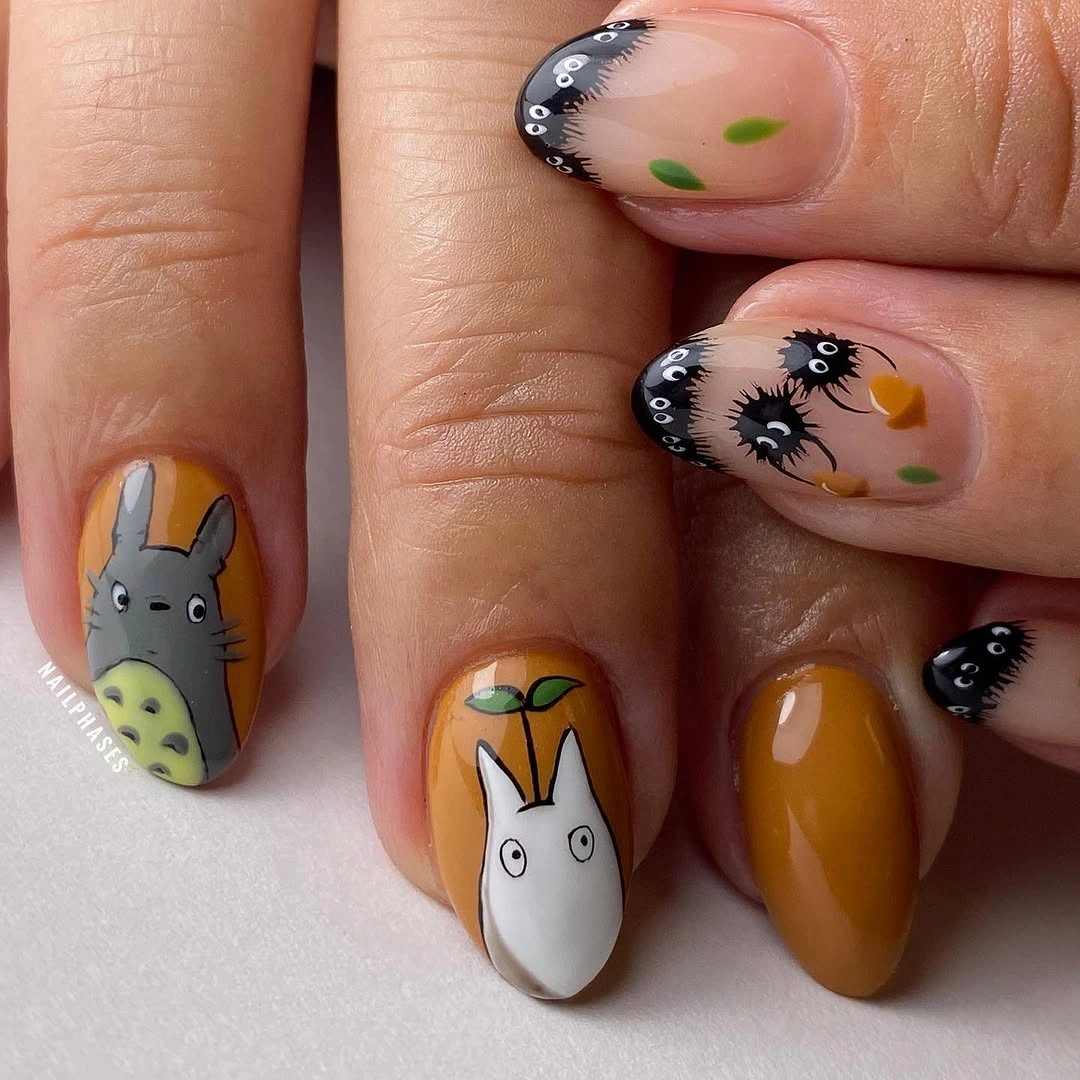 chic fall nails with autumn designs - Fun Autumn Characters on Mustard and Nude Nails