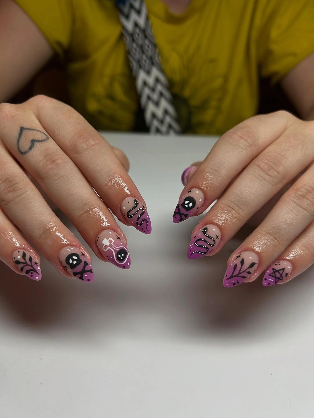chic fall nails with autumn designs - Purple Halloween Nails With Playful Gothic Art