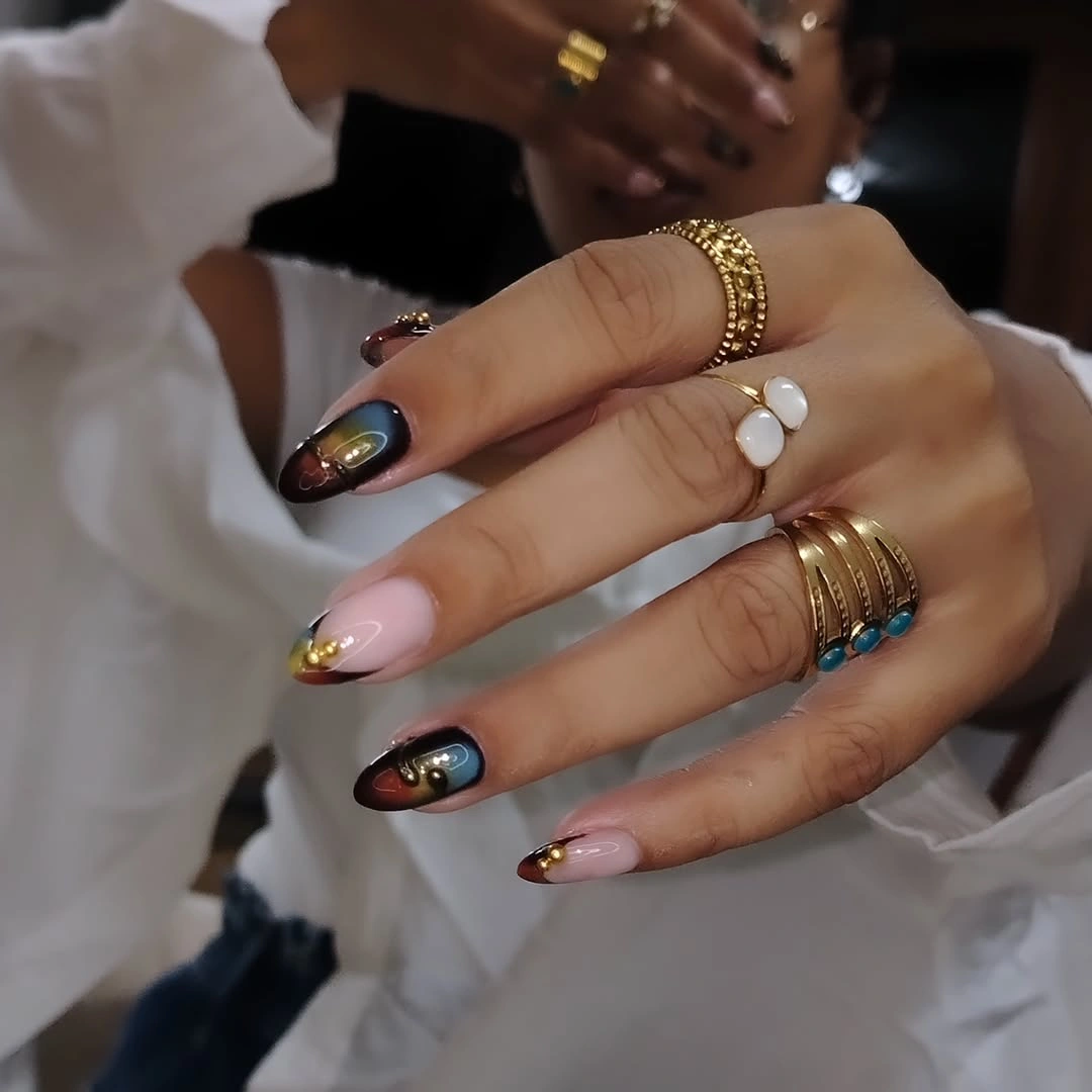 chic fall trendy nails 2026 Jewel Toned Tips With Tiny Gold Accents