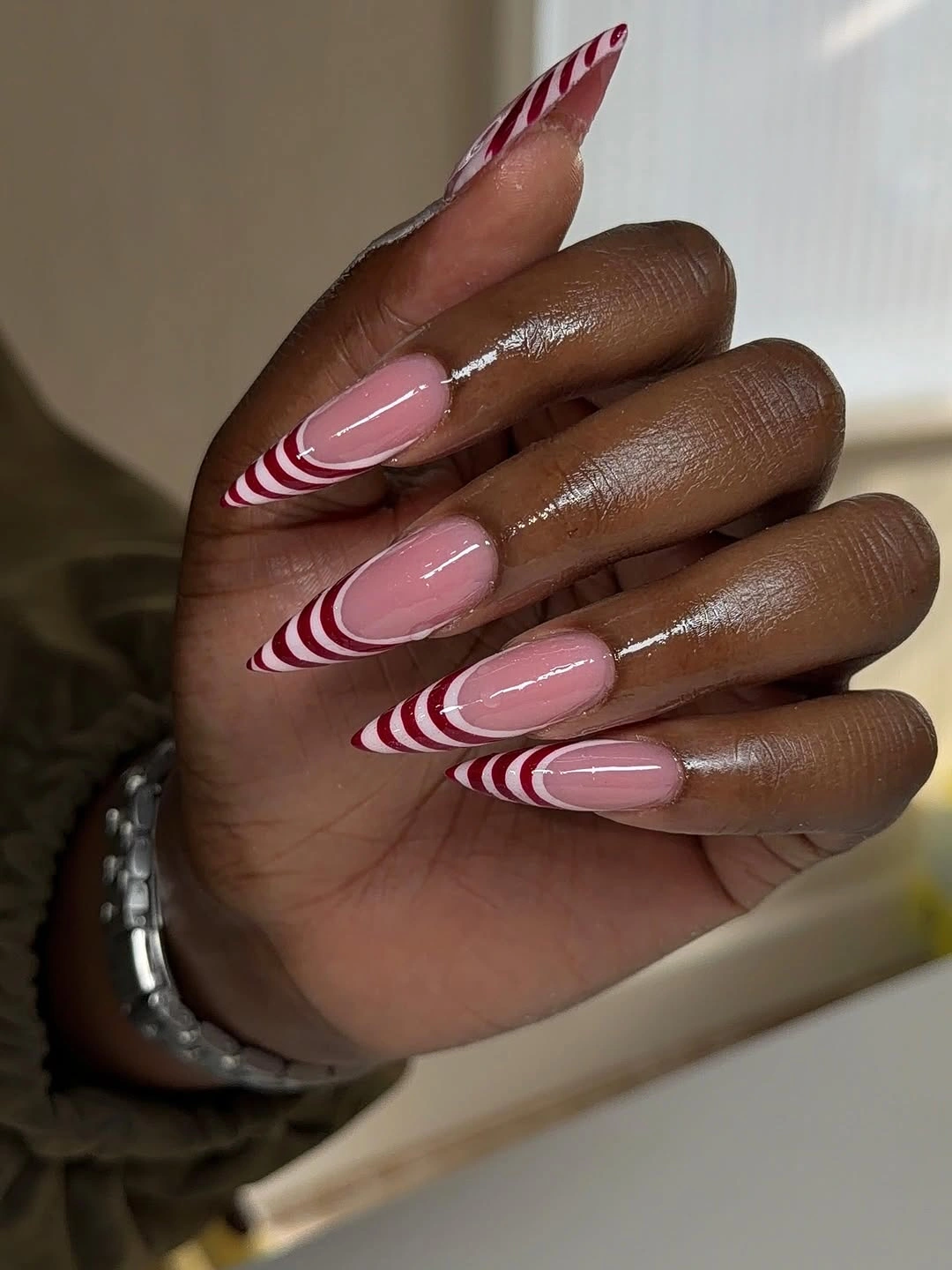 chic fall trendy nails 2026 Red and White Swirl Tips for a Sweet Fall Update