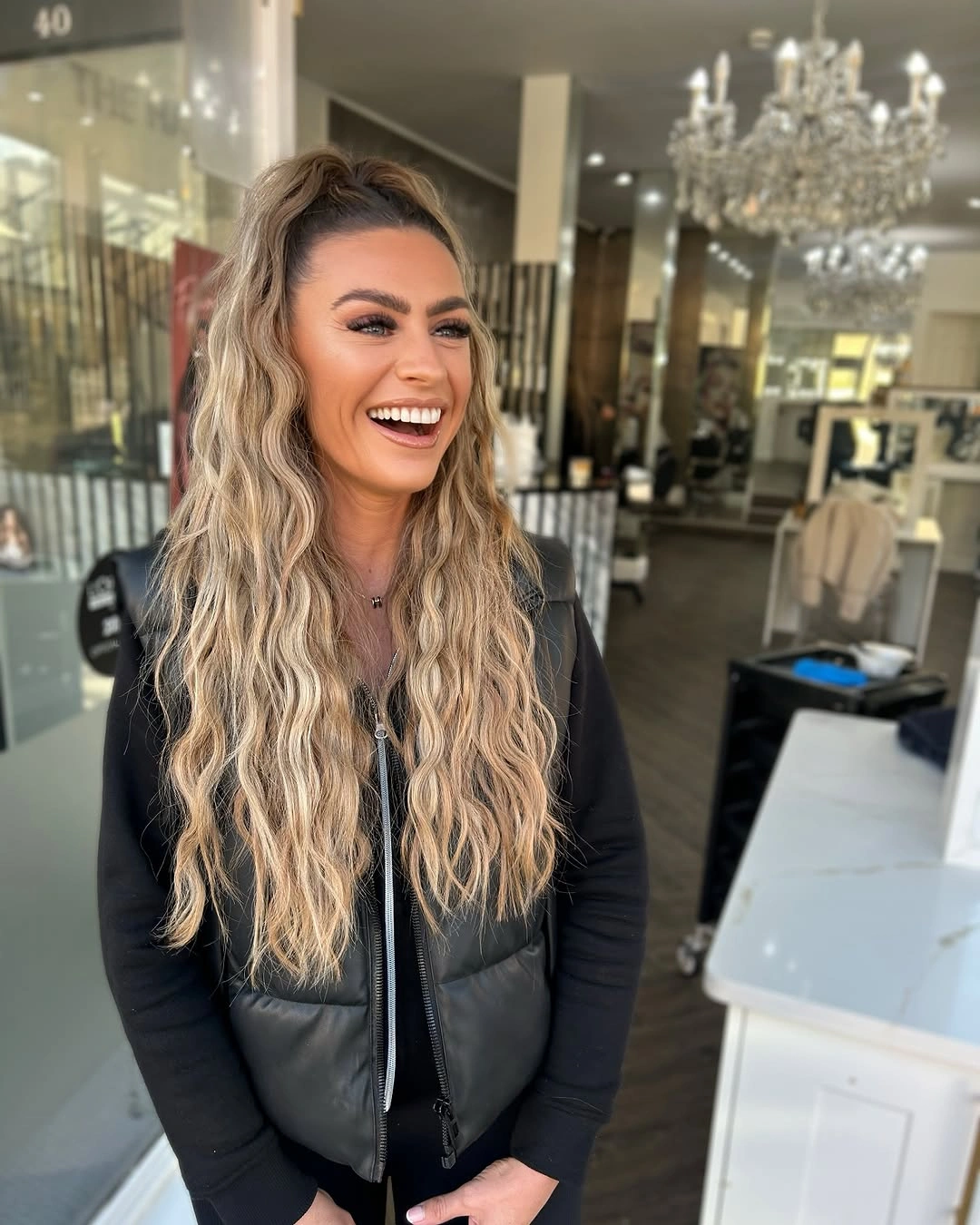 chic middle parting hairstyles - Long blonde half-up waves