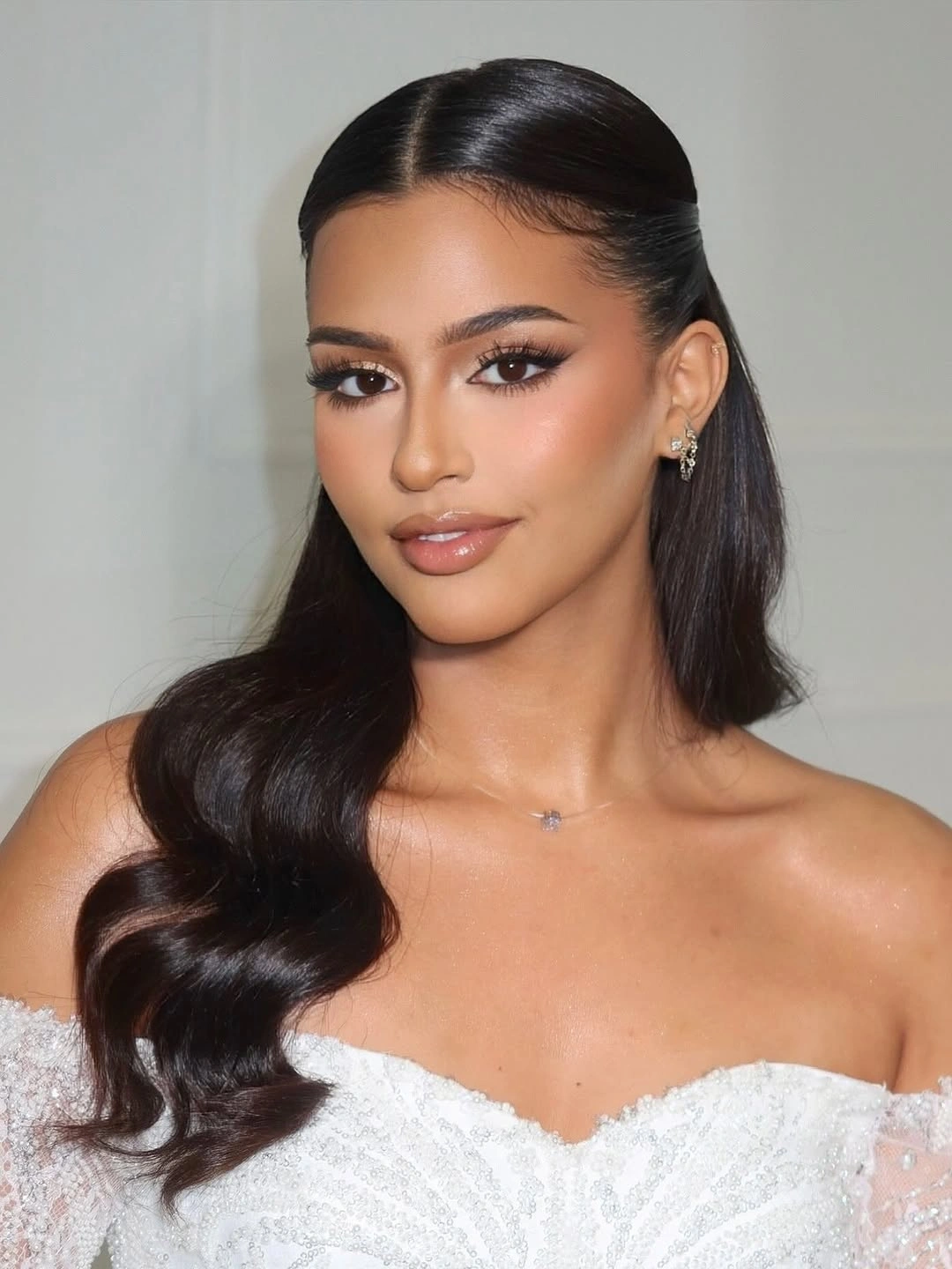 chic middle parting hairstyles - Sleek Middle Part With a Soft Glamour Wave