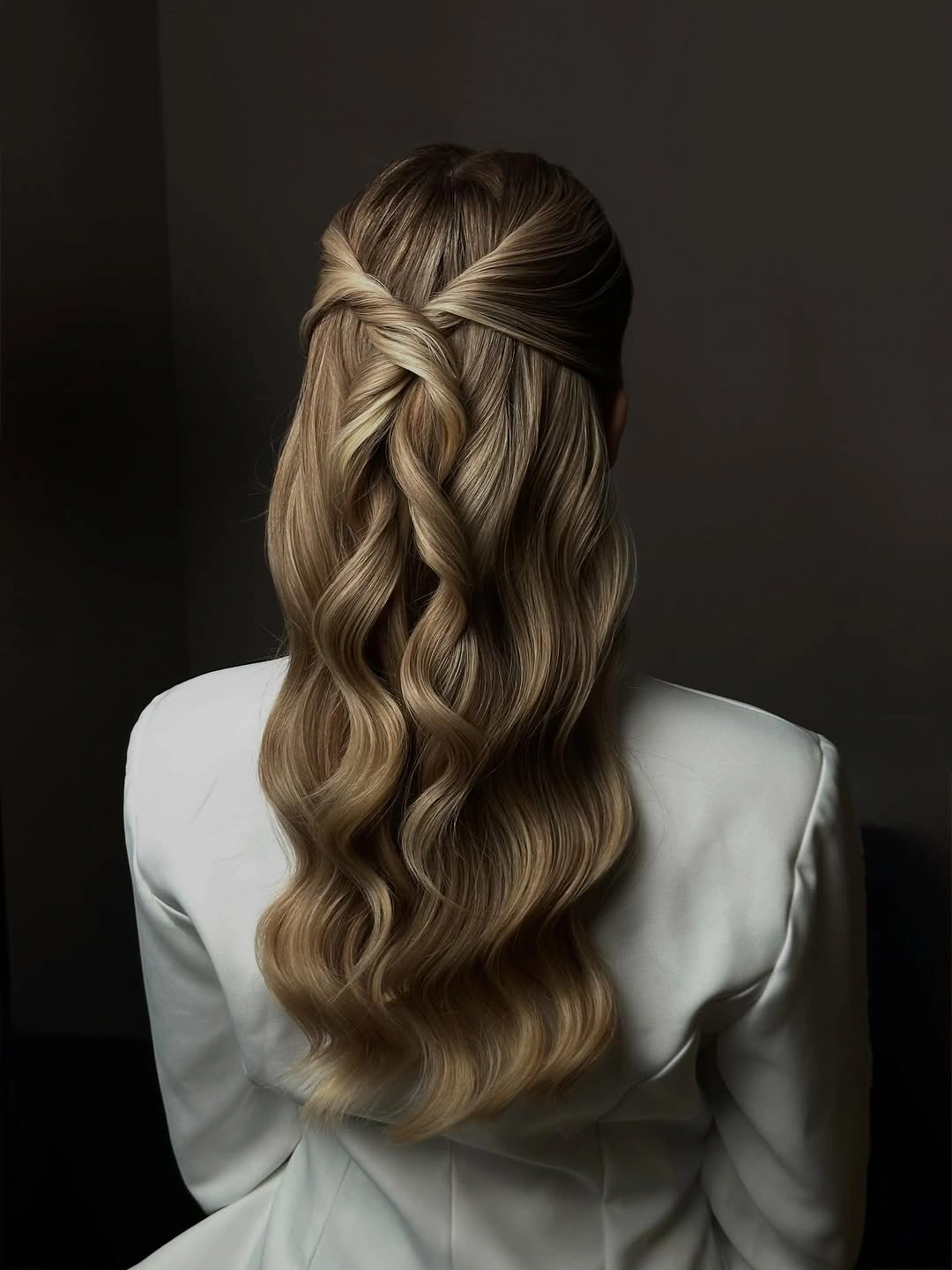chic middle parting hairstyles - Twisted Half Up Waves in Soft Blonde