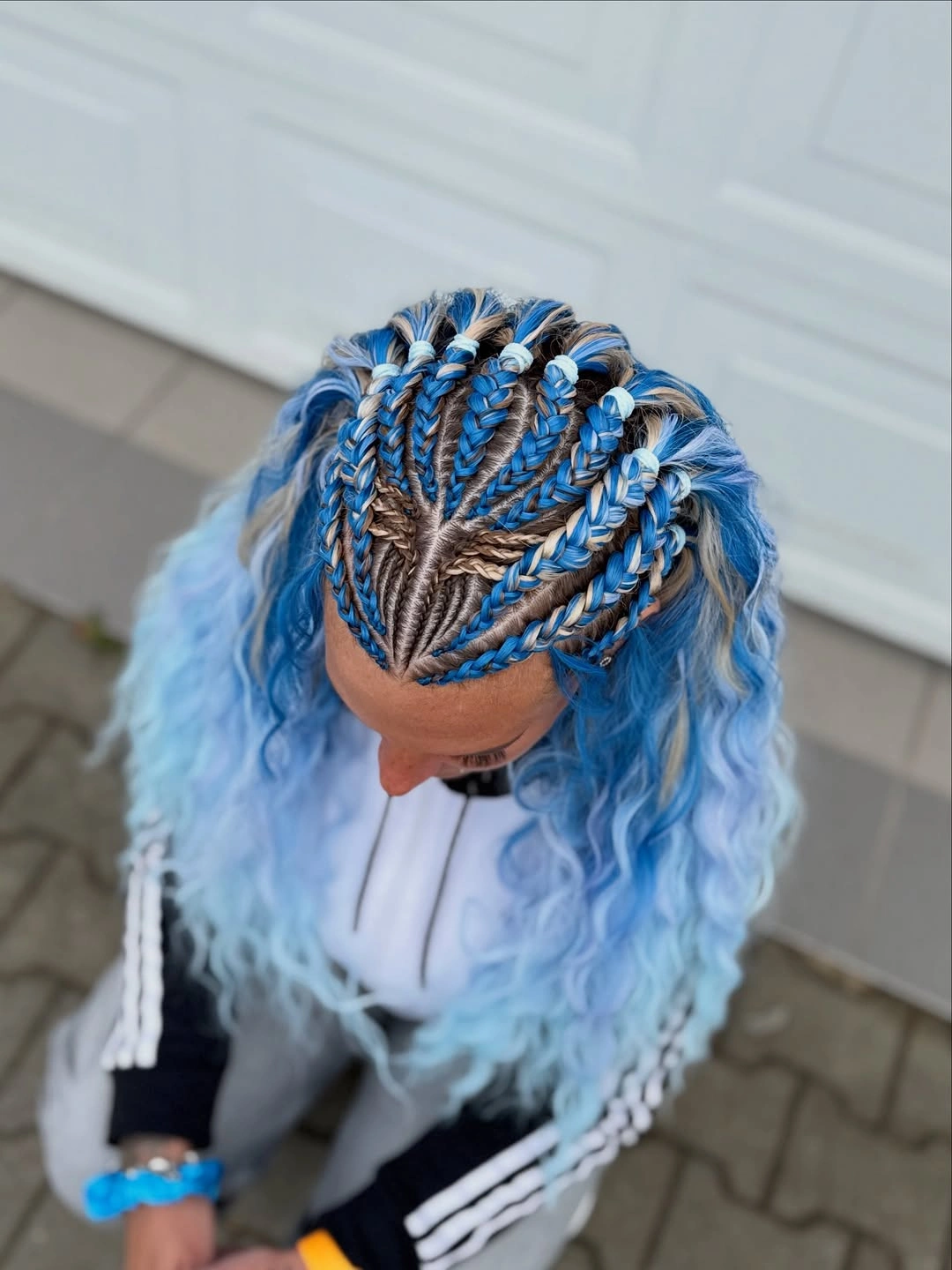 chic middle parting hairstyles - Blue Braids With Playful Curly Lengths