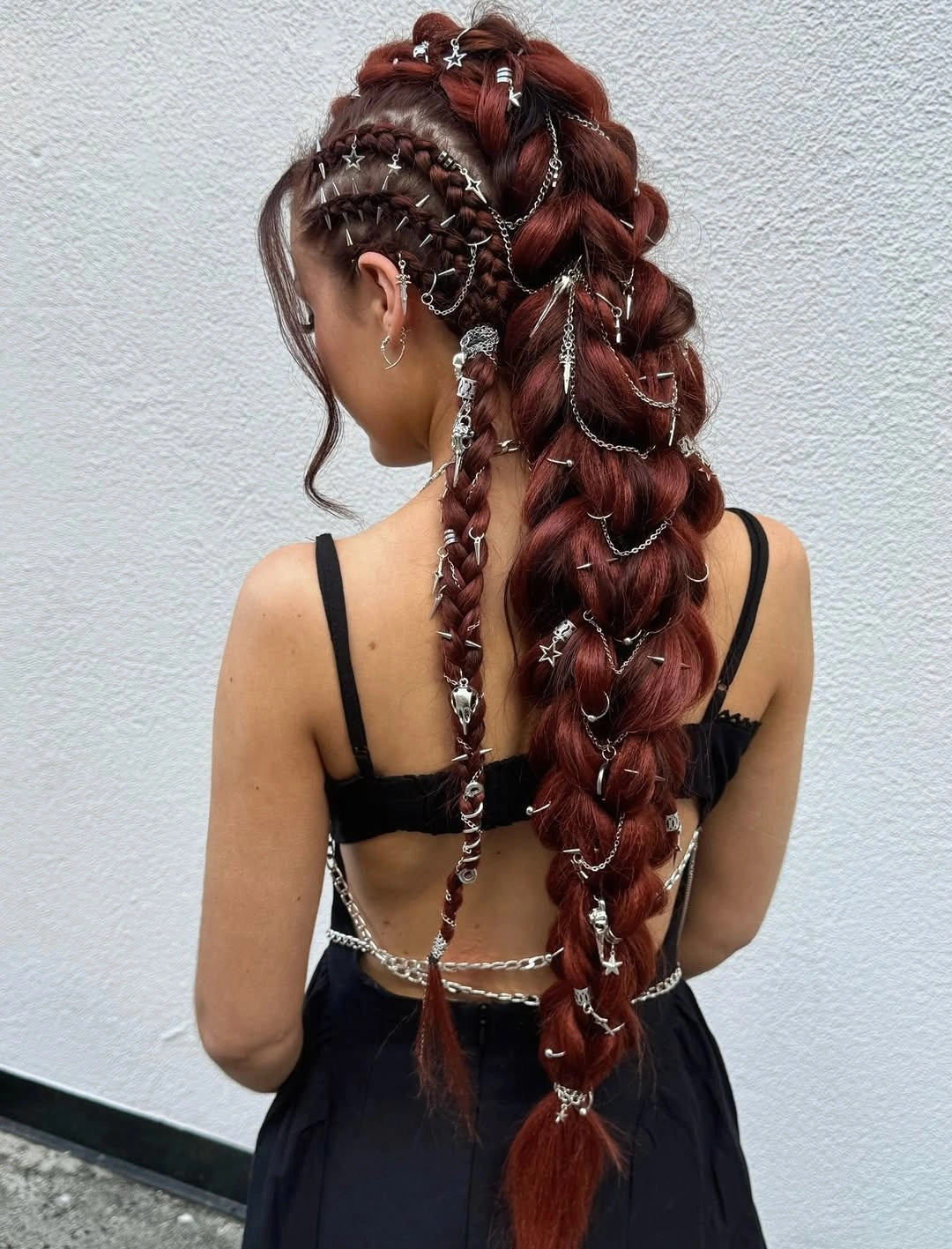 chic middle parting hairstyles - Dramatic braided middle-part updo