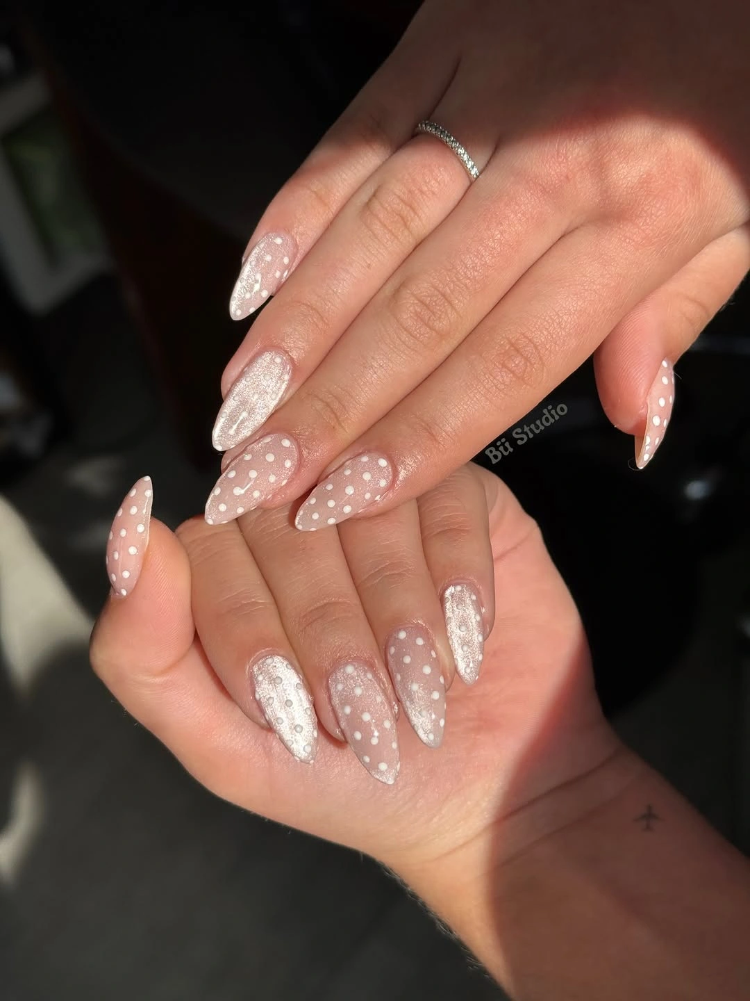 chic polka dot fall nails 2026 sheer white almond dot manicure