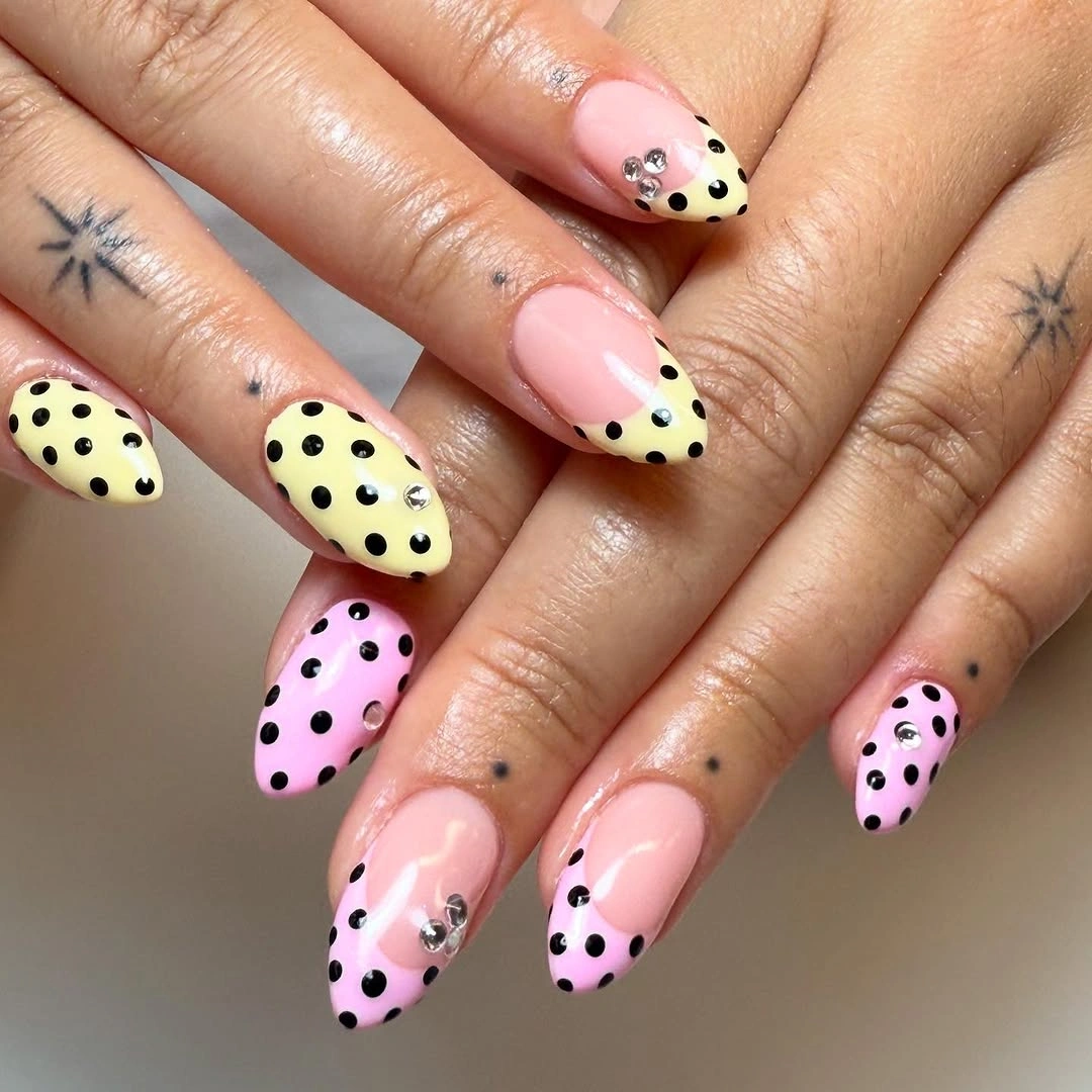 chic polka dot fall nails 2026 pink yellow and black dot design