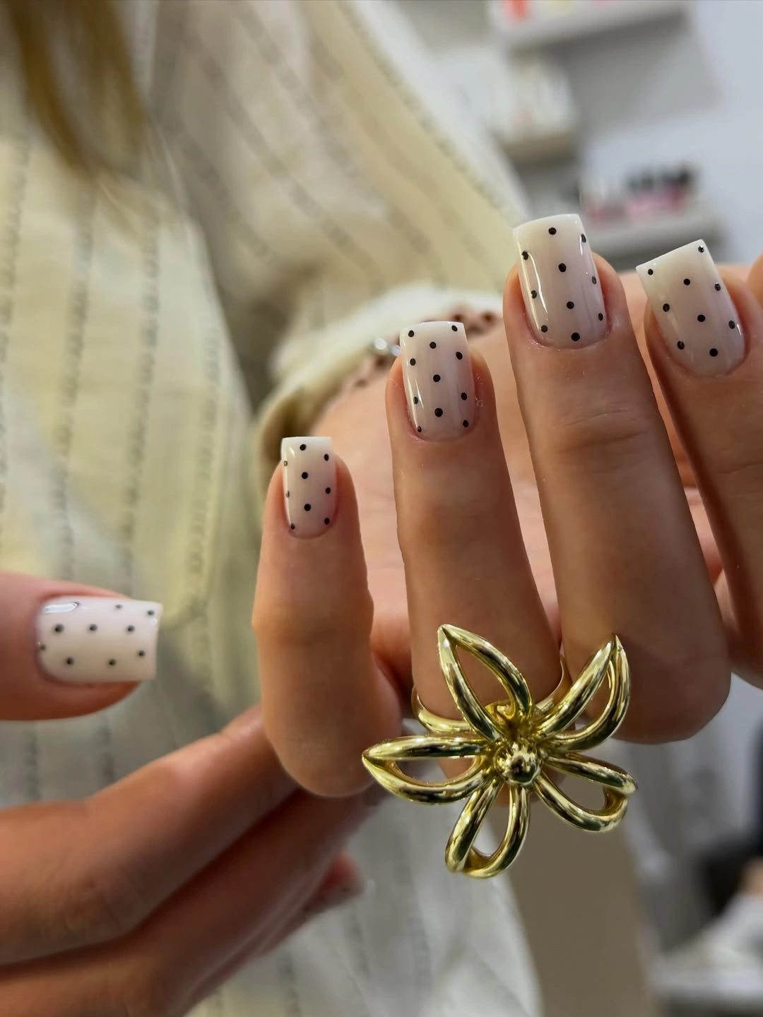 chic polka dot fall nails 2026 sheer white nails with black dots