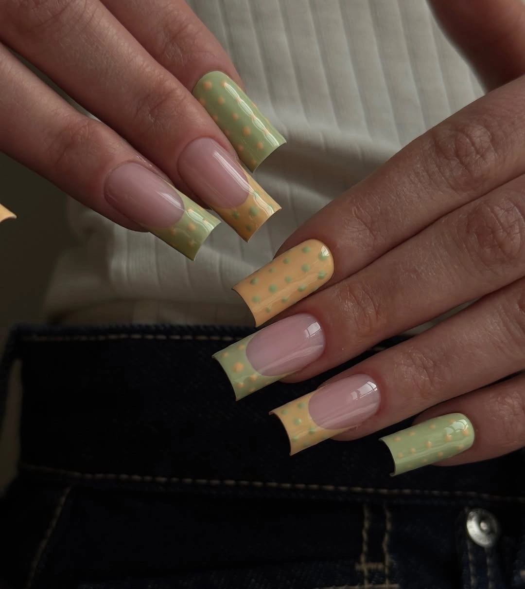 chic polka dot fall nails 2026 pastel green yellow French tips