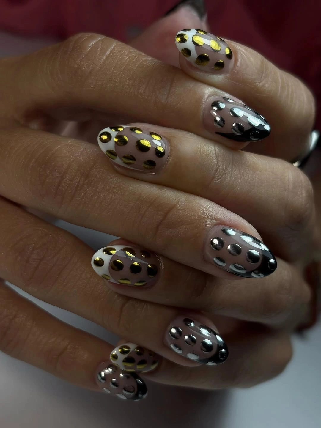 chic polka dot fall nails 2026 metallic black gold and silver dots