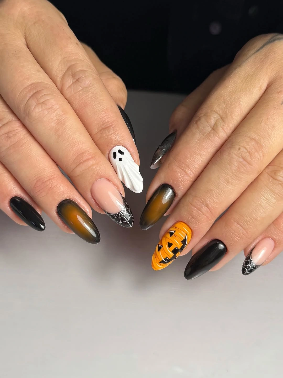 cute fall nails with pumpkins 2026 Black and Amber Halloween Glam