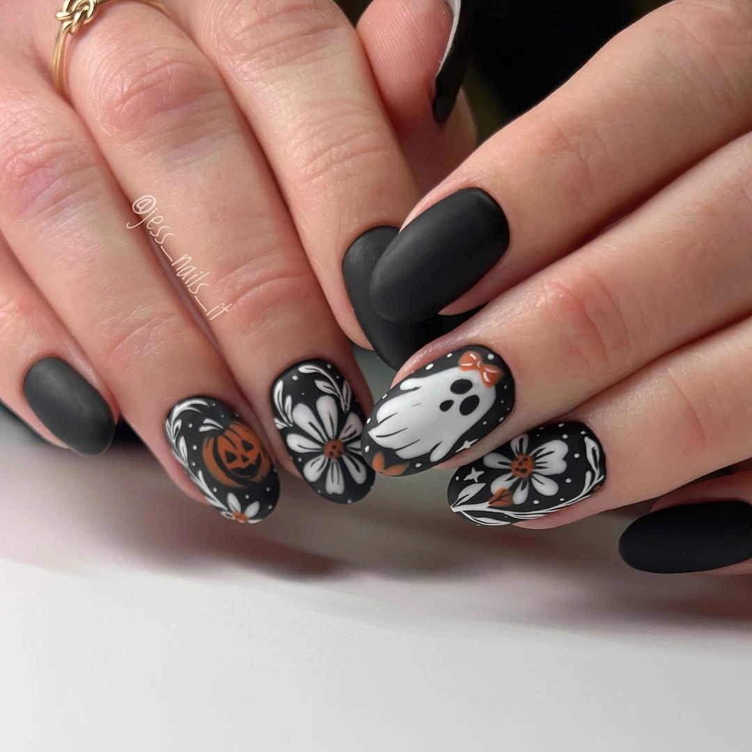 cute fall nails with pumpkins 2026 Moody Black Pumpkin Nails With Ghosts and Flowers