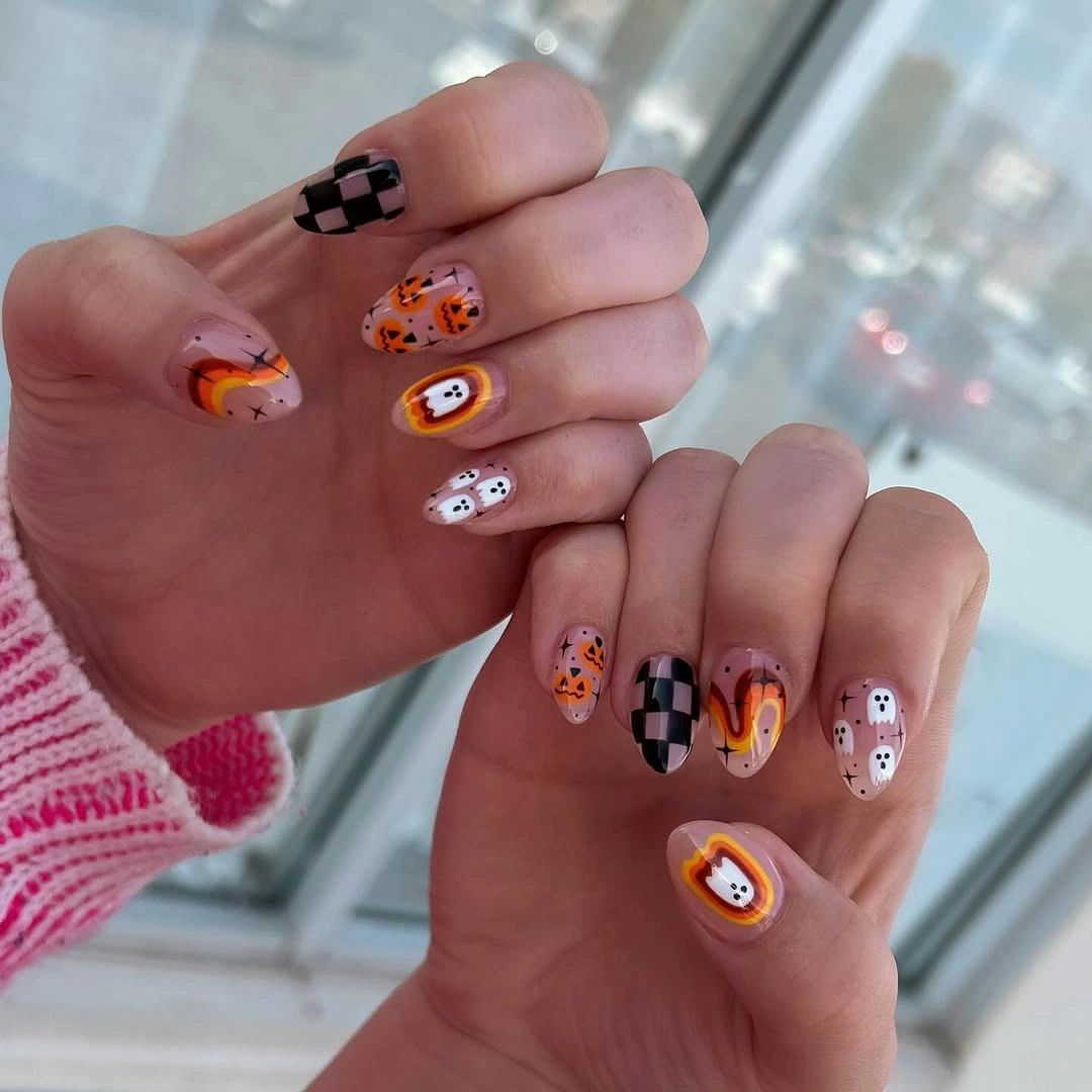 cute fall nails with pumpkins 2026 Playful Ghosts and Pumpkin Patchwork