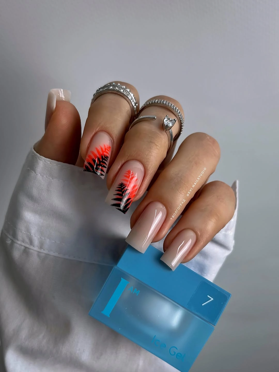 elegant fall mid length nails 2026 Neon Botanical Accents on a Soft Nude Base