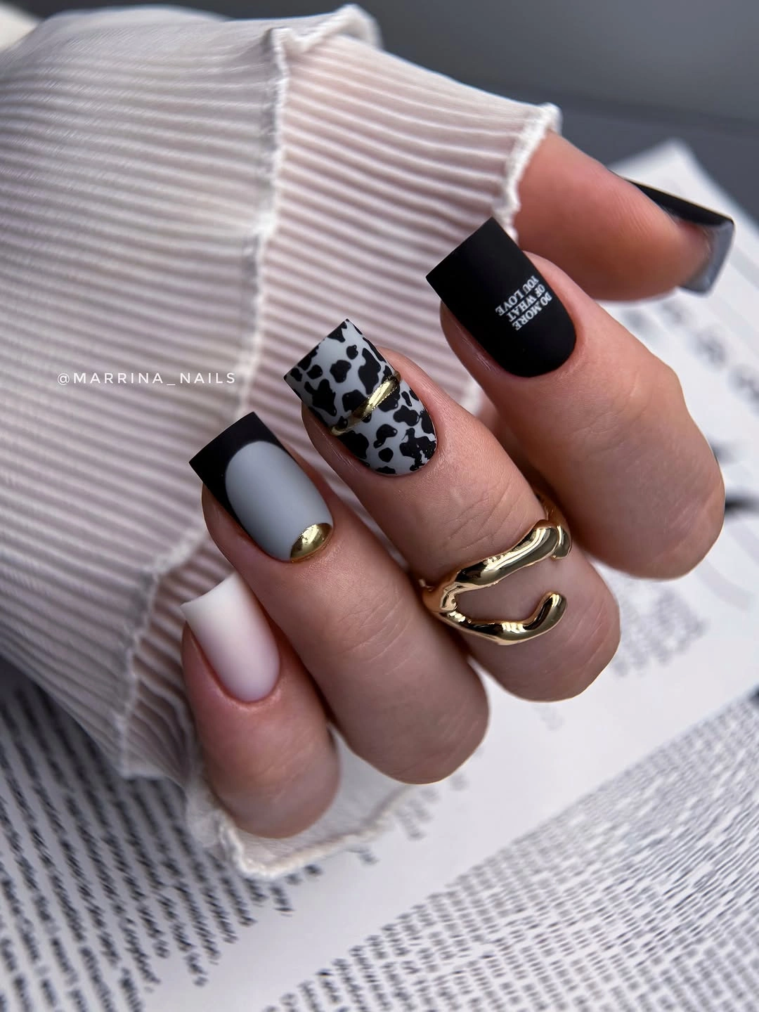 elegant fall mid length nails 2026 Modern Monochrome with Chic Cow Print Details