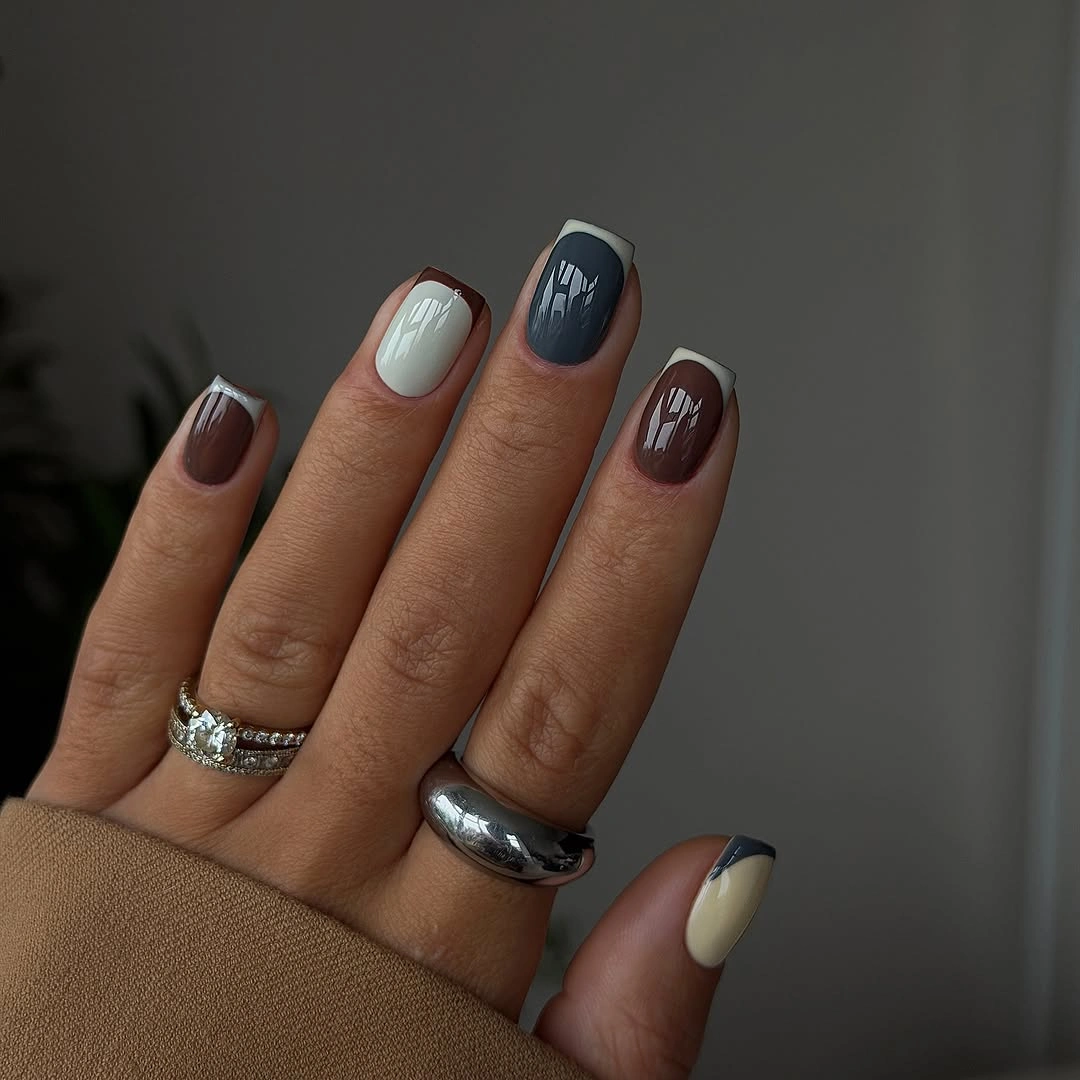 elegant fall mid length nails 2026 Rich Earth Tones with a Contemporary French Edge