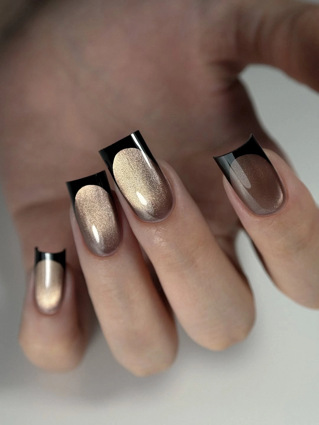 elegant fall mid length nails 2026 Champagne Chrome with Bold Black French